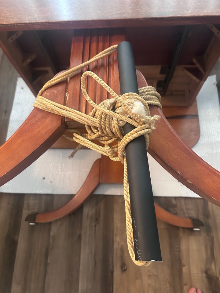 Tourniquet applied to hold the dining table leg together during a recent operation