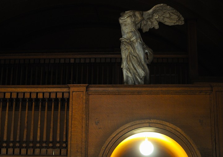 Sculpture at one end of the FLW playroom in front o the three-tier gallery